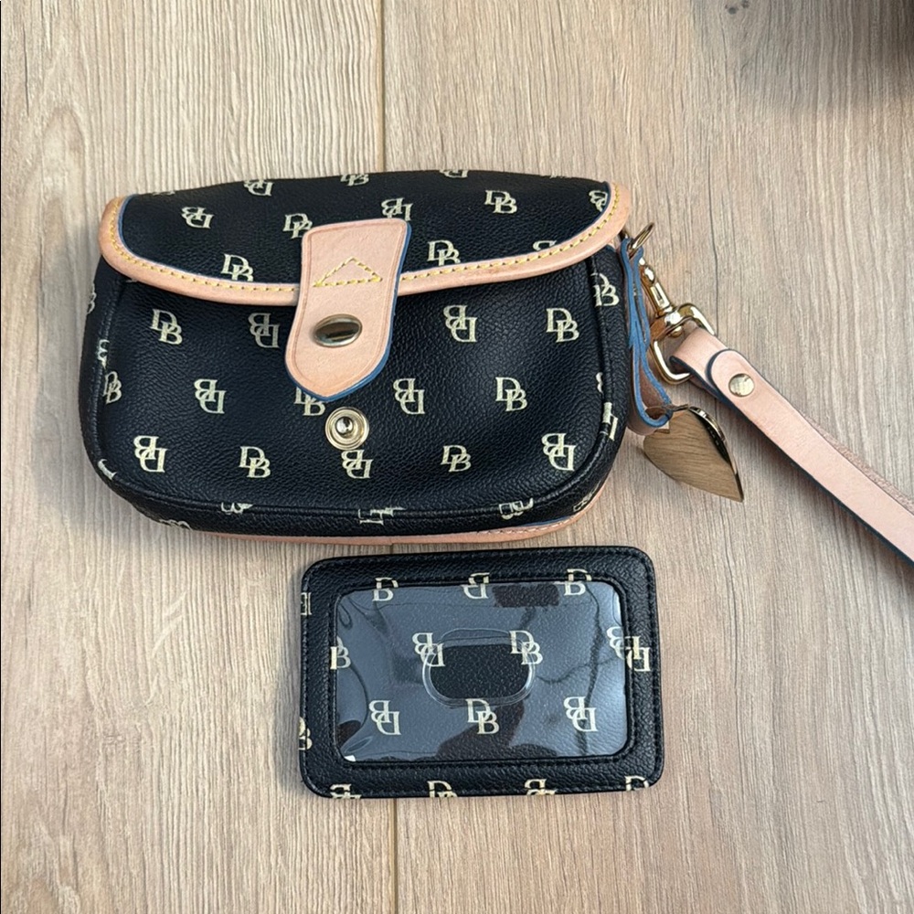 Dooney & Bourke Black and Tan Clutch Wristlet